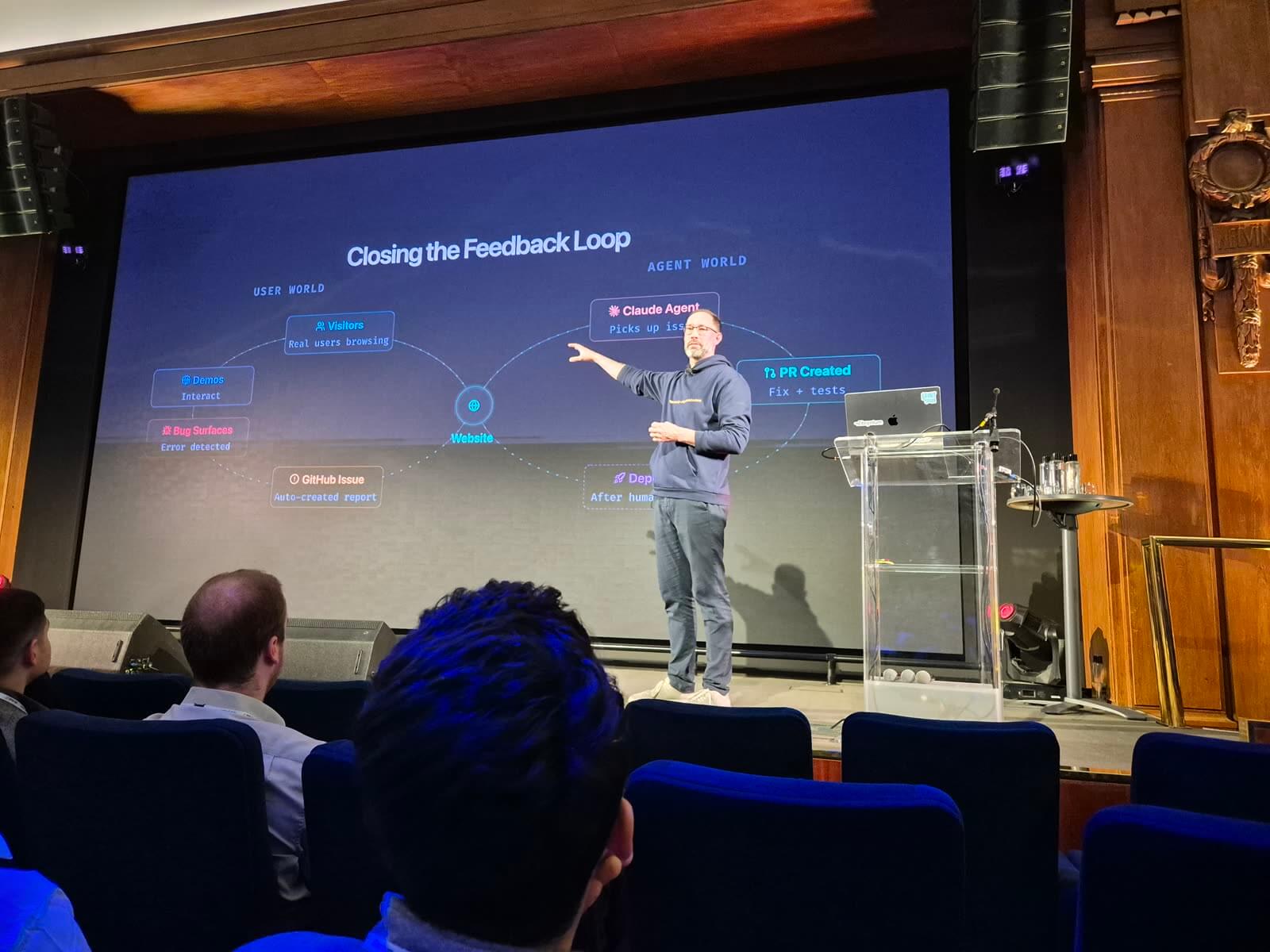 "Closing the Feedback Loop" slide showing User World and Agent World as overlapping cycles.